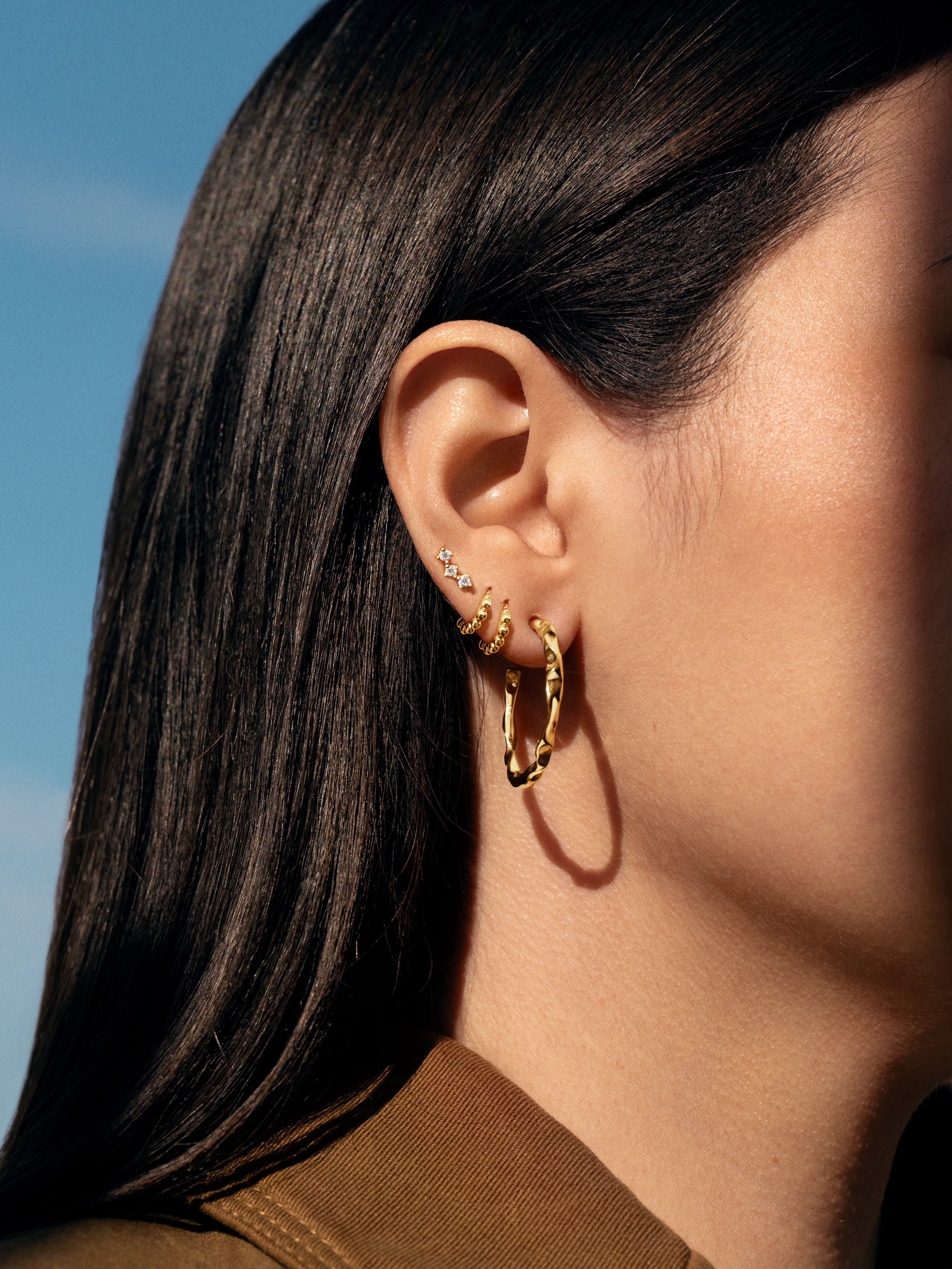 Triple Spark Gold Single Earring