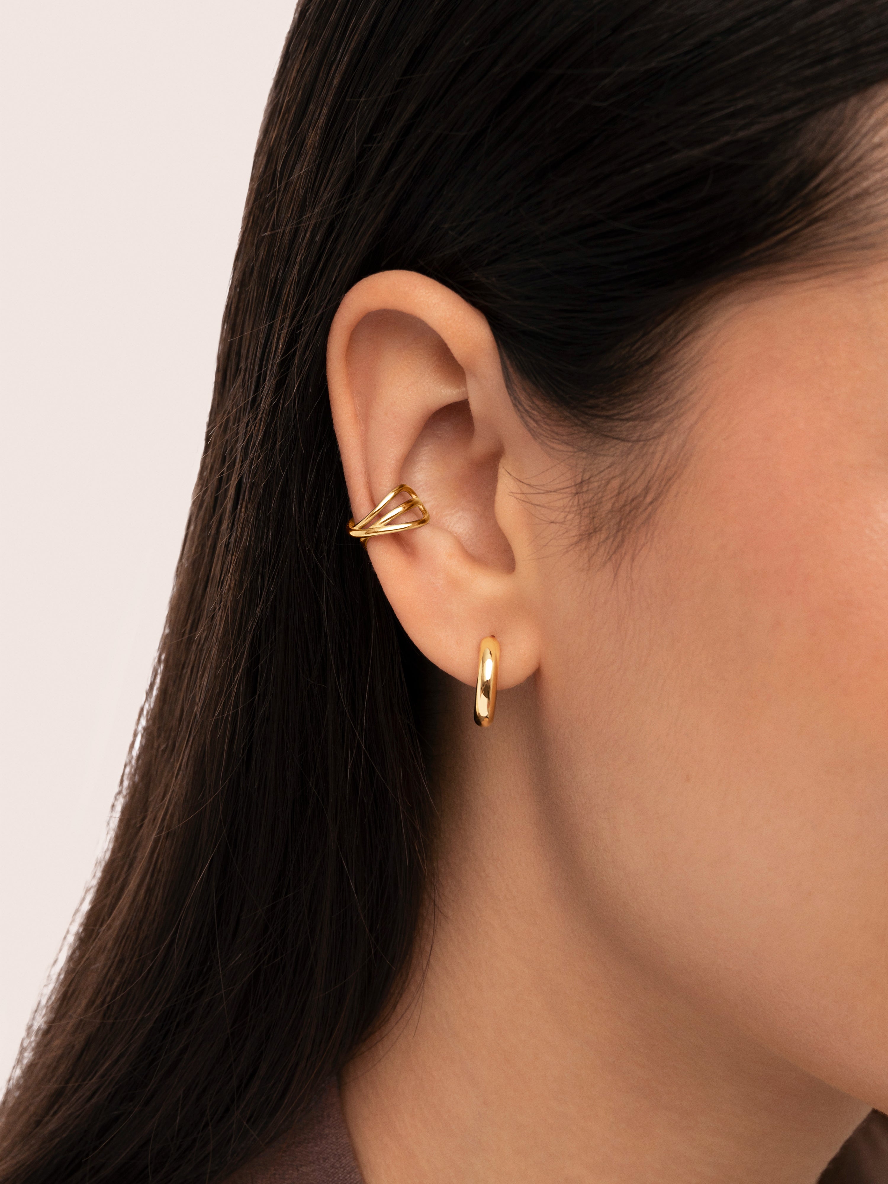 Pendiente Suelto Ear Cuff Triple Cross Baño Oro