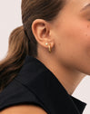 Mini Spark Star Gold-Plated Silver Single Earring - puesto en modelo